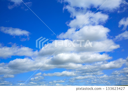 Blue sky with clouds in a summer day 133623427