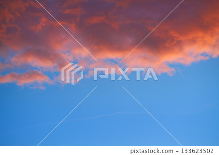 Sunset sky clouds orange and blue Sunset sky clouds orange and blue 133623502