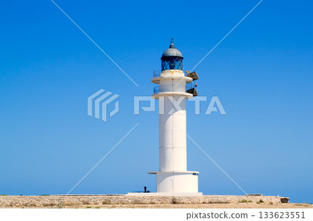 Formentera Barbria Lighthouse in blue sky Formentera Barbria Lighthouse in blue sky 133623551