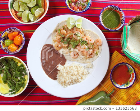 shrimp tacos rice and frijoles chili sauces Mexican shrimp tacos rice and frijoles chili sauces Mexican 133623568