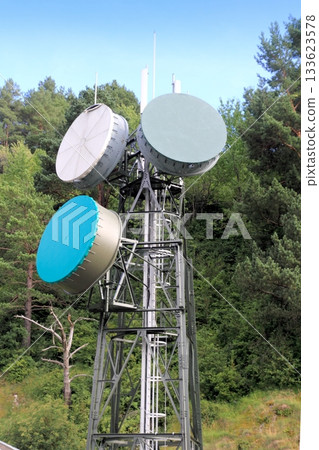 communication tower antenna in outdoor forest 133623578