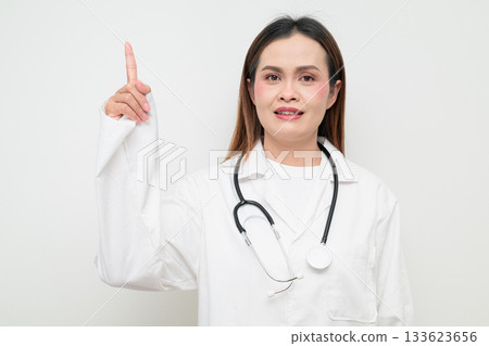 Asian Healthcare Professional Doctor in White Coat Pointing Finger 133623656