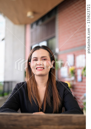 Happy Smiling Thai Business Woman Outdoors in Professional Attire Happy Smiling Thai Business Woman Outdoors in Professional Attire 133623721