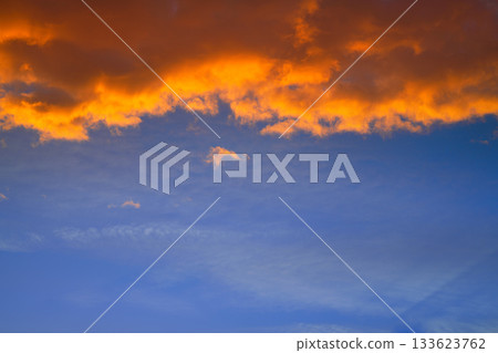 Sunset sky clouds orange and blue Sunset sky clouds orange and blue 133623762