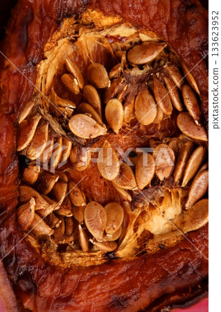 Oven baked pumpkin with seeds 133623952