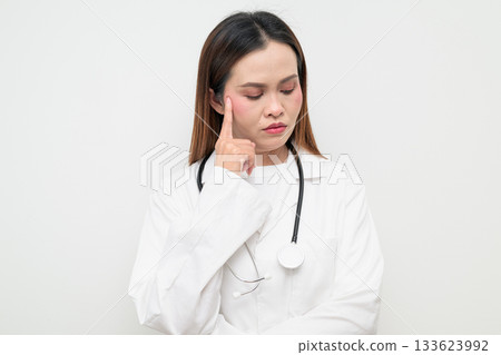 Asian Healthcare Professional Doctor in White Coat Studio Portrait Asian Healthcare Professional Doctor in White Coat Studio Portrait 133623992