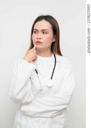 Asian Healthcare Professional Doctor in White Coat Studio Portrait Asian Healthcare Professional Doctor in White Coat Studio Portrait 133623993
