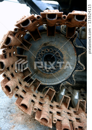 Caterpillars steel wheels from a snowblower 133624115