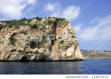 Alicante Cape Nao view from sea in blue sunny Mediterranean day 133624131