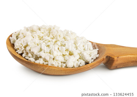Cottage Cheese, Curd in wooden spoon isolated on white background with full depth of field Cottage Cheese, Curd in wooden spoon isolated on white background with full depth of field 133624455