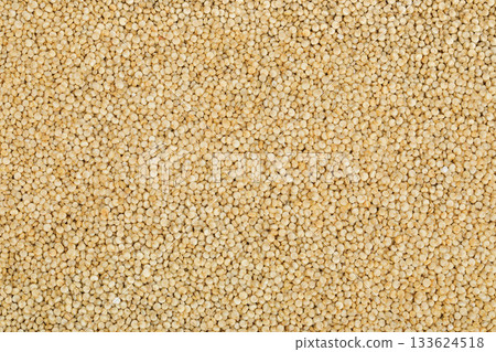 white quinoa seeds as a background. Top view. Flat lay white quinoa seeds as a background. Top view. Flat lay 133624518