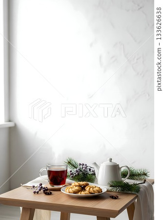 Winter Tea Time with Cookies, Teapot, and Christmas Decoration on a Wooden Table 133626638