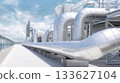 Industrial piping system with shiny metallic tubes extending along a modern facility, showcasing advanced engineering and infrastructure design 133627104