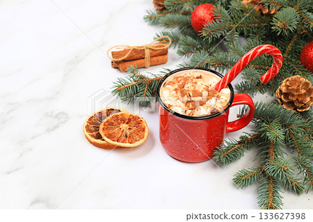 Christmas alcoholic or non-alcoholic chocolate cocktail with marshmallows and cinnamon, warming winter drink in the cold season on a concrete background, Christmas holiday grog, eggnog, Christmas alcoholic or non-alcoholic chocolate cocktail with marshmallows and cinnamon, warming winter drink in the cold season on a concrete background, Christmas holiday grog, eggnog, 133627398