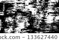 A black and white grunge background. Paints strokes backdrop in black and white. A black-and-white ink splats texture. 133627440