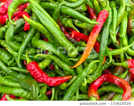 Colorful array of fresh chili peppers at a local market in autumn 133628526