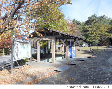 Autumn scenery of Unuma Forest with information boards and rest areas 133631291