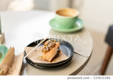 Open sandwich with salmon served on plate with 133632266