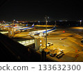 Plane landing at the airport at night 133632300
