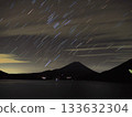 Star trails reflected on Lake Motosu 133632304