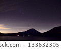 Dawn sky and stars streaming over Lake Motosu 133632305