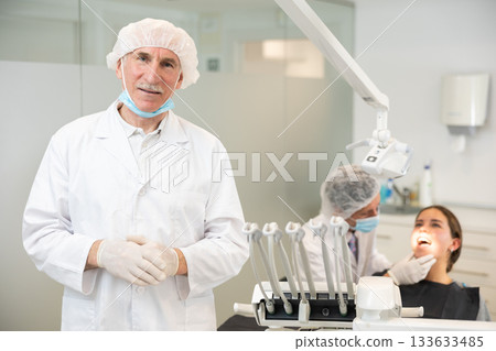 Elderly man doctor in dental office 133633485