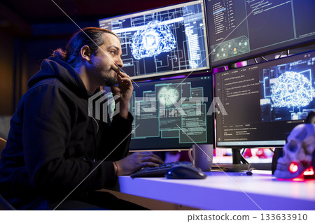 Hacker installing spyware with artificial intelligence to secretly gather data about user activity. Rogue engineer coding exploits using machine learning to gain unauthorized access 133633910