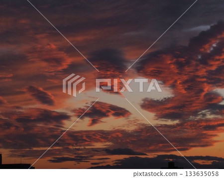 A beautiful sunset seen from the Arakawa River bank in Kawaguchi City 133635058