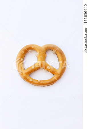 Salted pretzel on a white background. Isolate Salted pretzel on a white background. Isolate 133636440