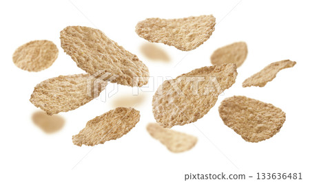Rice flakes levitate on a white background Rice flakes levitate on a white background 133636481