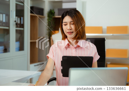 Woman start up small business owner at workplace. small business entrepreneur SME or freelance asian woman working with box at home. Woman start up small business owner at workplace. small business entrepreneur SME or freelance asian woman working with box at home. 133636661