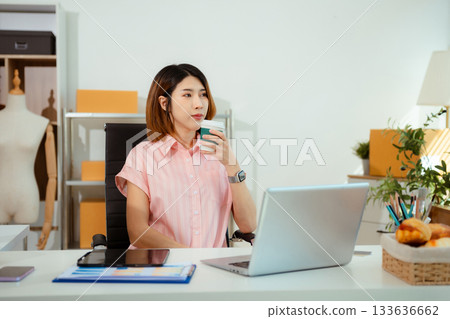 Successful Woman online seller. small business entrepreneur SME or Asian woman working freelance with online sell at home. 133636662