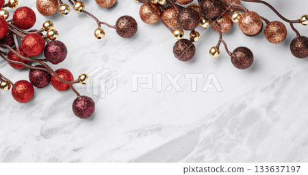 Christmas ornament on marble table background, top view 133637197