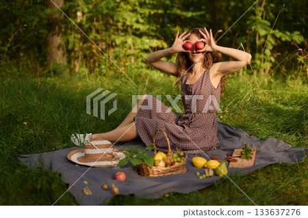 European young woman ponders life amid tranquil woodland setting European young woman ponders life amid tranquil woodland setting 133637276