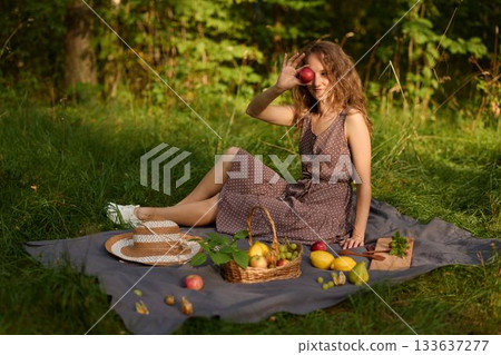 Young woman enjoying peaceful woodland setting in natural attire Young woman enjoying peaceful woodland setting in natural attire 133637277