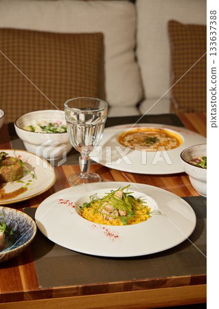 Indulge in Gourmet Dishes Served Within a Modern and Elegant Dining Setting Experience Indulge in Gourmet Dishes Served Within a Modern and Elegant Dining Setting Experience 133637388
