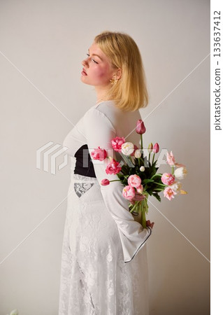 Bright studio scene capturing lively dance and floral elegance Bright studio scene capturing lively dance and floral elegance 133637412