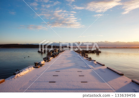 Pier at Lake Ogawara in snowy winter Pier at Lake Ogawara in snowy winter 133639456