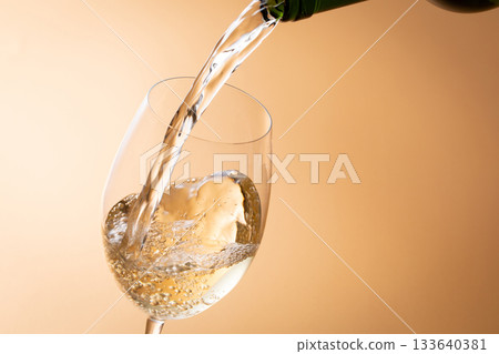 Pour white wine 133640381