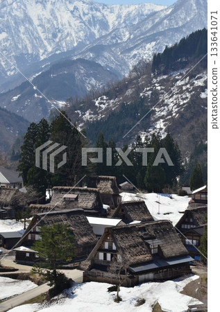 Winter scenery in Ainokura Gassho-style village in Toyama Prefecture. Ainokura, located in Gokayama, is a village in Shirakawa-go, with its Gassho-style houses and idyllic scenery. Winter scenery in Ainokura Gassho-style village in Toyama Prefecture. Ainokura, located in Gokayama, is a village in Shirakawa-go, with its Gassho-style houses and idyllic scenery. 133641071