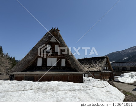 Winter scenery in Ainokura Gassho-style village in Toyama Prefecture. Ainokura, located in Gokayama, is a village in Shirakawa-go, with its Gassho-style houses and idyllic scenery. Winter scenery in Ainokura Gassho-style village in Toyama Prefecture. Ainokura, located in Gokayama, is a village in Shirakawa-go, with its Gassho-style houses and idyllic scenery. 133641091
