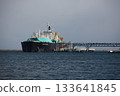 A ship at anchor transporting LNG (liquefied natural gas) as an imported energy source 133641845