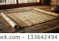 A traditional bamboo mat used to roll and soba noodles to achieve uniform thickness 133642494