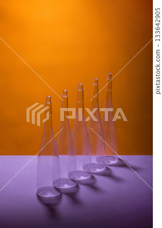 Still life with figures of conical shape on a colored background Still life with figures of conical shape on a colored background 133642905