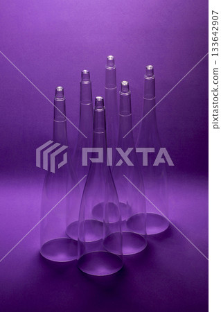 Deep purple, Still life with conical shapes on a purple background 133642907