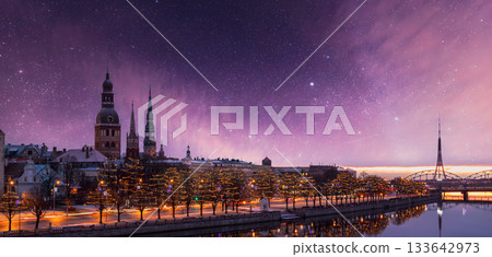 Riga, Latvia, Europe. Cityscape In Morning Time. Night View Of Castle, Dome Cathedral And St. Peter's Church. Popular Place With Famous Landmarks. UNESCO. Old Town In Street Christmas Decoration Riga, Latvia, Europe. Cityscape In Morning Time. Night View Of Castle, Dome Cathedral And St. Peter's Church. Popular Place With Famous Landmarks. UNESCO. Old Town In Street Christmas Decoration 133642973