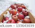 Fresh-tasting apples chilled in a natural snow room 133643039