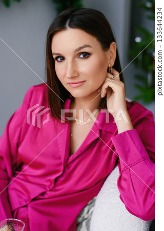 Beauty Portrait Of Woman In Pink Satin Blouse 133644234