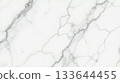 High-contrast seamless Carrara marble texture with dramatic diagonal gray veining over a bright white polished background. High-contrast seamless Carrara marble texture with dramatic diagonal gray veining over a bright white polished background. 133644455