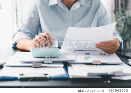 Business person with contract law and paper work for business finance, loan application form, contract real estate and insurance concept. signing contract, working on desk, business document 133645350